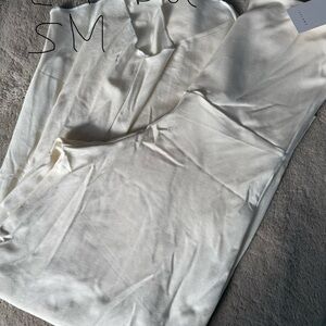 Elegant Cream Sleeveless Dress